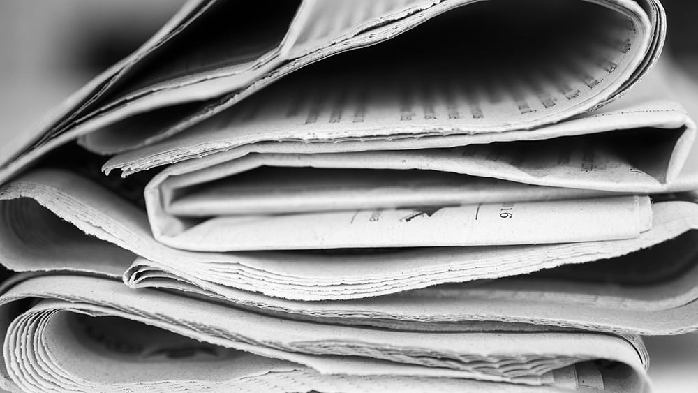 newspaper-stack-press-release